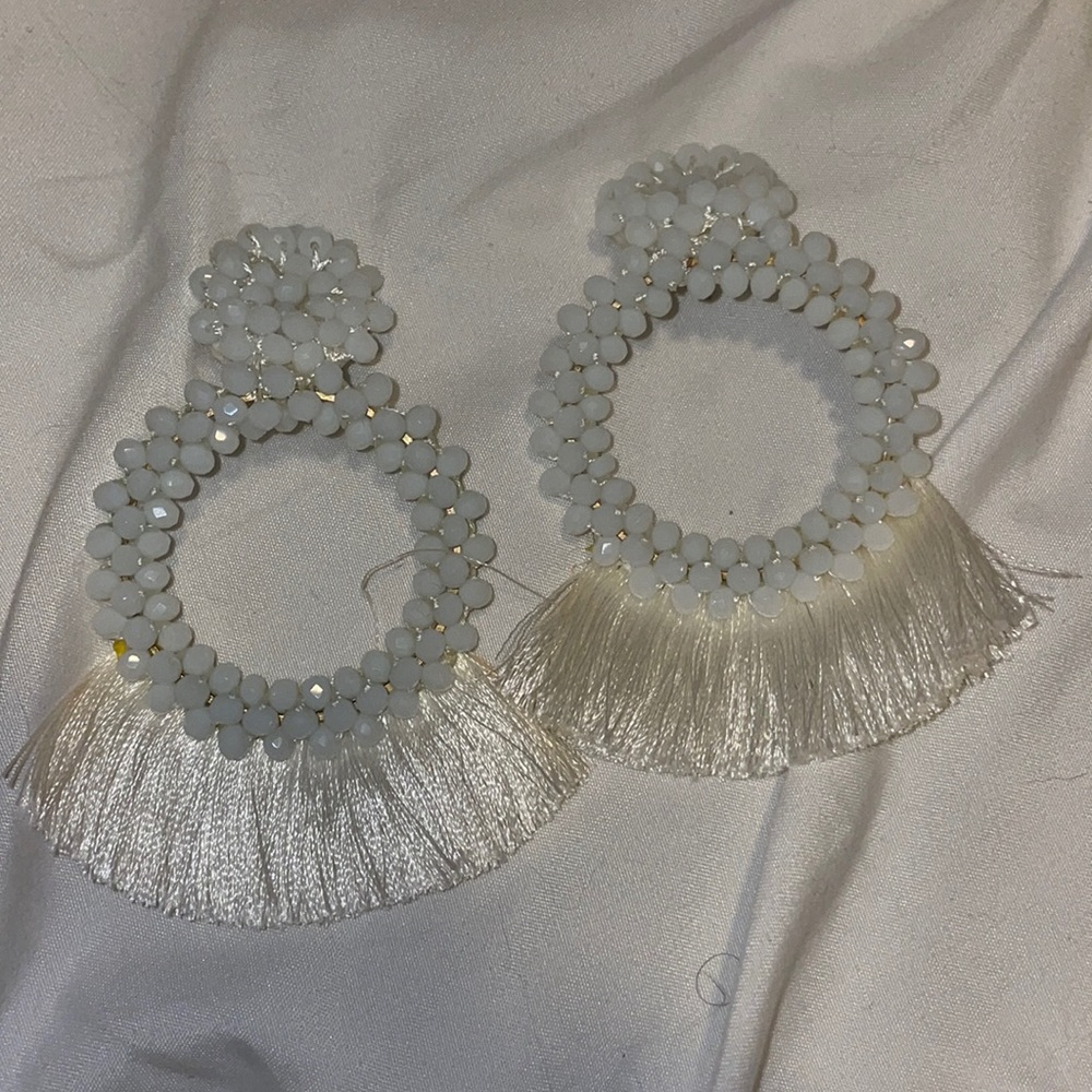 White decorative earrings